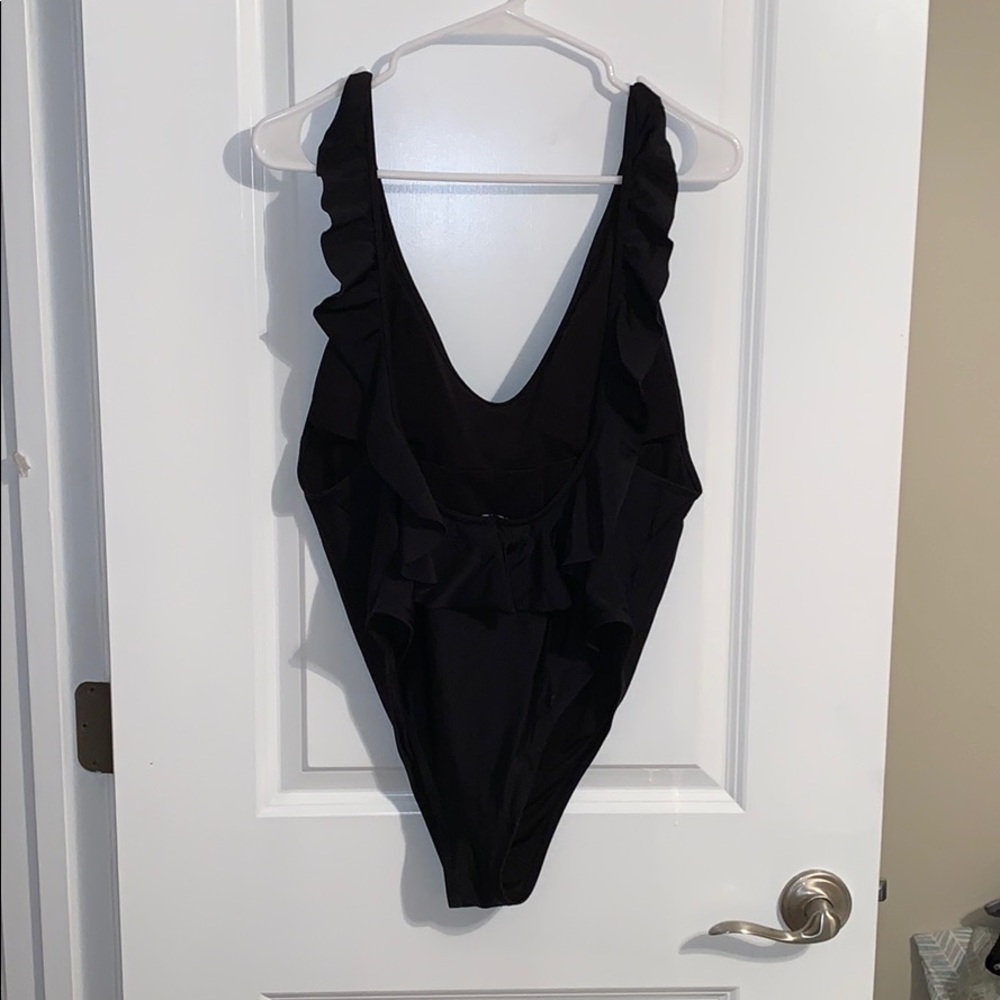 Low back cheeky ruffle one piece